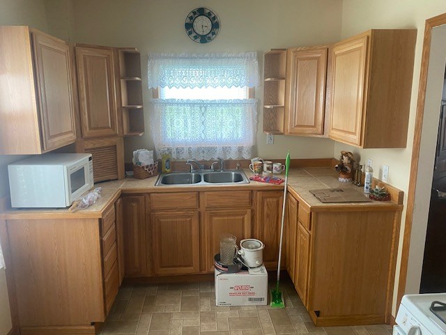 1007 Perryville Road Parker, PA 16049 - Photo 7 of 20 a room with sink a washer and dryer
