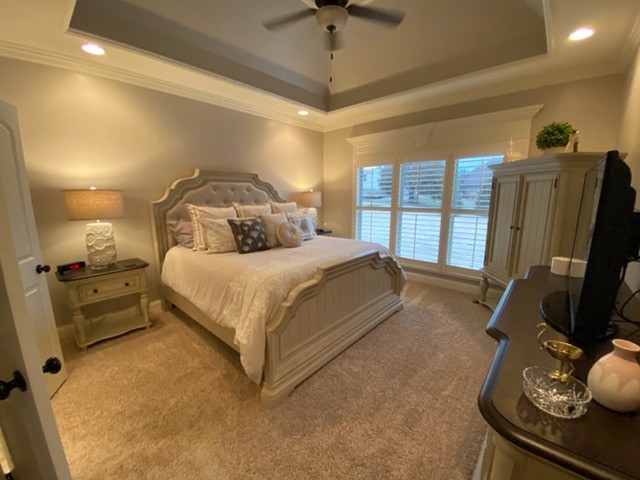 445 Huntington Drive Lebanon, TN 37087 - Photo 18 of 50 a bedroom with a bed and a flat tv screen on dresser