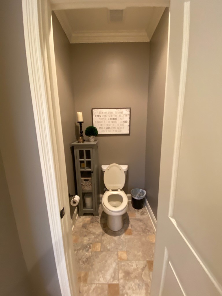445 Huntington Drive Lebanon, TN 37087 - Photo 25 of 50 a bathroom with a toilet and a mirror