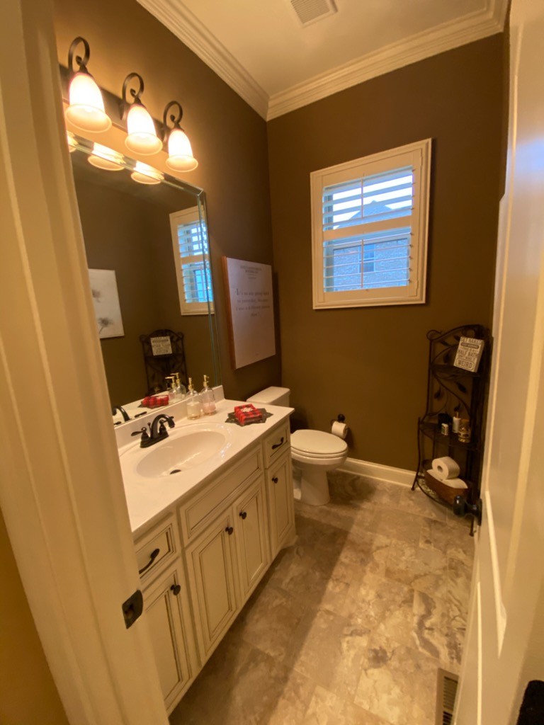 445 Huntington Drive Lebanon, TN 37087 - Photo 29 of 50 a bathroom with a double vanity sink mirror and toilet