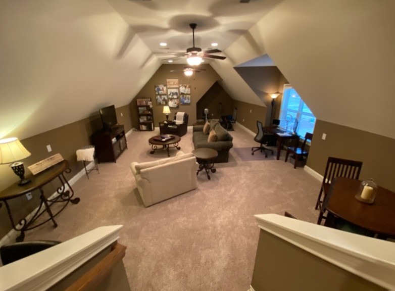 445 Huntington Drive Lebanon, TN 37087 - Photo 40 of 50 a living room with furniture and a chandelier