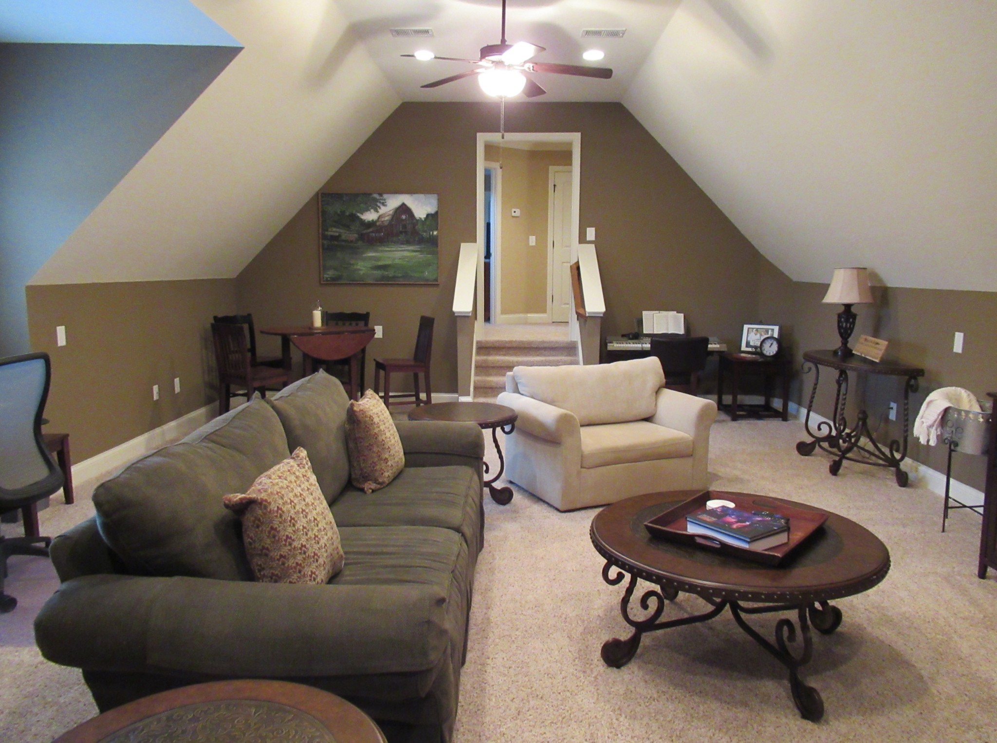 445 Huntington Drive Lebanon, TN 37087 - Photo 42 of 50 a living room with furniture and a chandelier