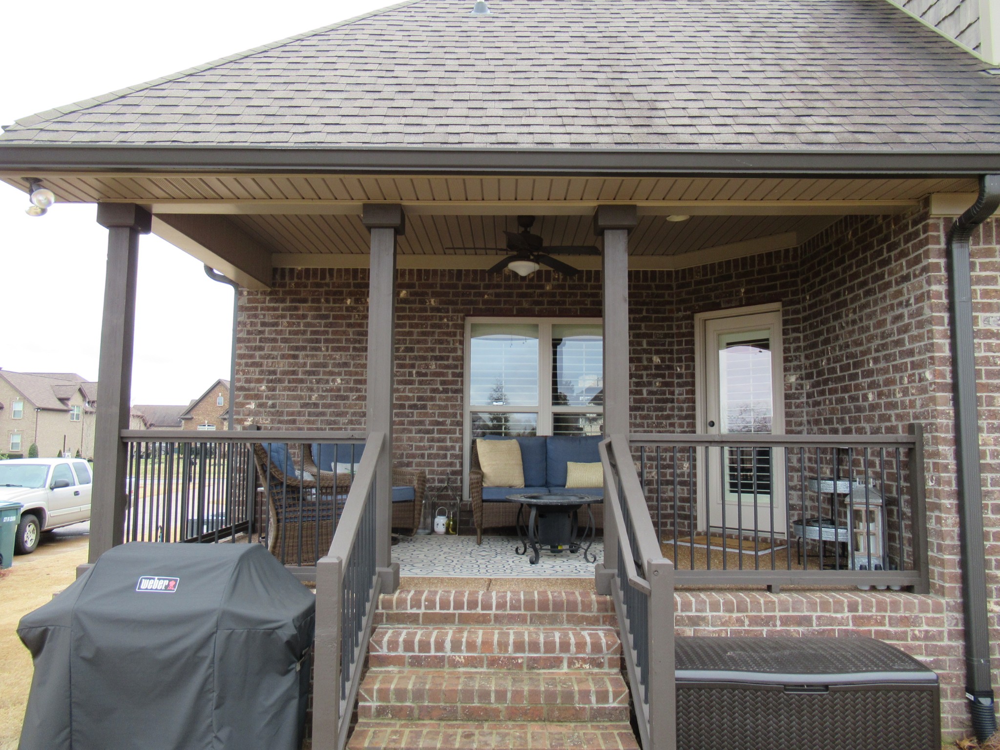 445 Huntington Drive Lebanon, TN 37087 - Photo 45 of 50 a view of a patio with couches chairs and wooden floor
