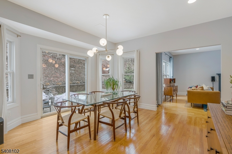 5 Ridge Road Warren, NJ 07059 - Photo 12 of 39 a view of a dining room with furniture window and wooden floor