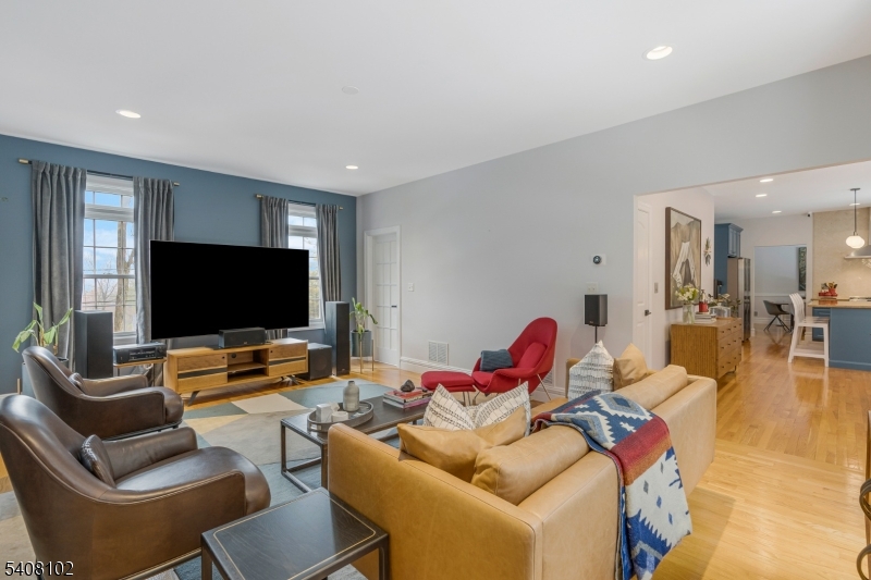 5 Ridge Road Warren, NJ 07059 - Photo 14 of 39 a living room with furniture and a flat screen tv
