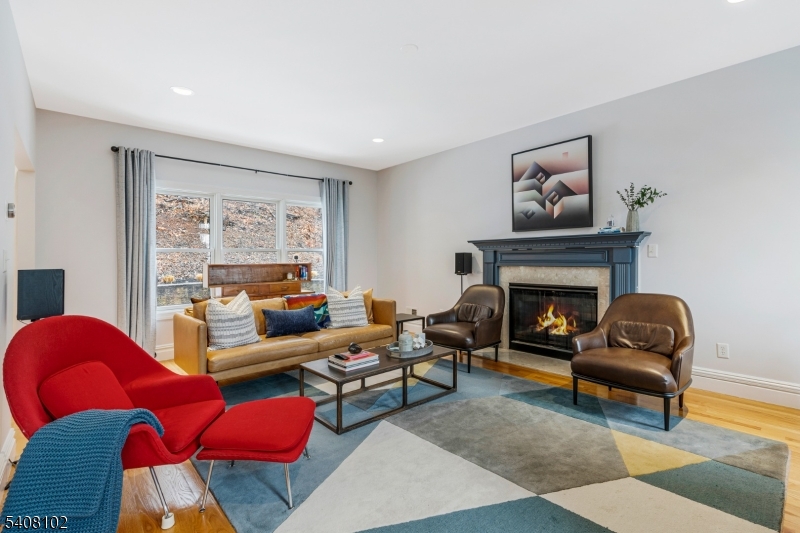5 Ridge Road Warren, NJ 07059 - Photo 15 of 39 a living room with furniture fireplace and window
