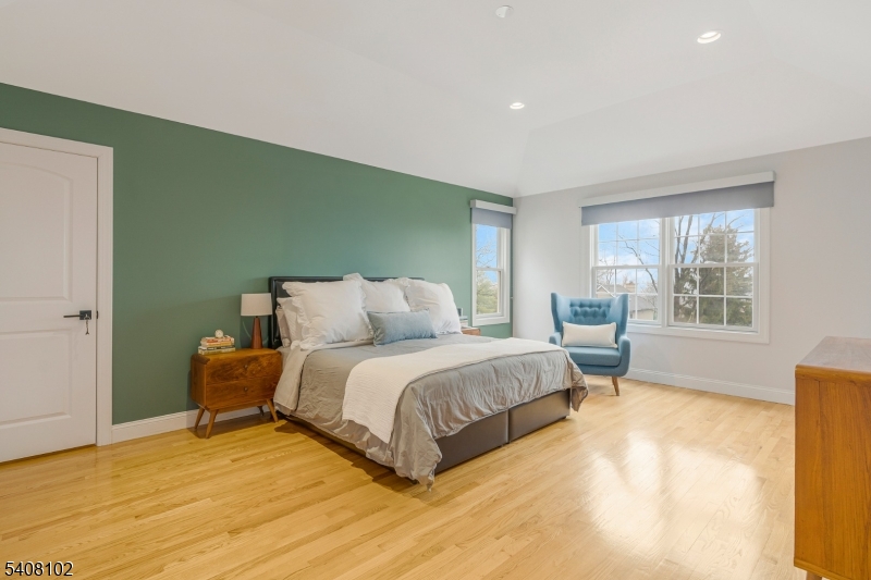 5 Ridge Road Warren, NJ 07059 - Photo 19 of 39 a spacious bedroom with a bed and a window