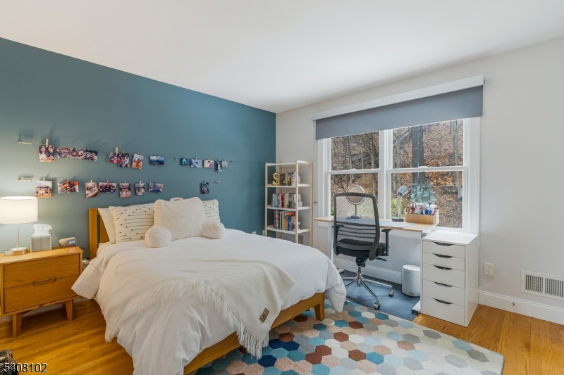 5 Ridge Road Warren, NJ 07059 - Photo 24 of 39 a bedroom with a bed and a window