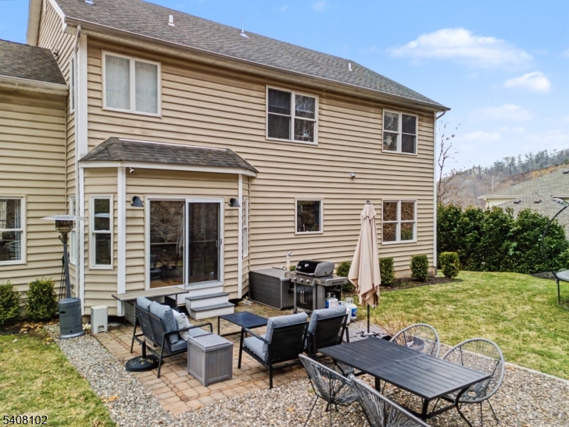5 Ridge Road Warren, NJ 07059 - Photo 34 of 39 a backyard of a house with yard fire pit and outdoor seating