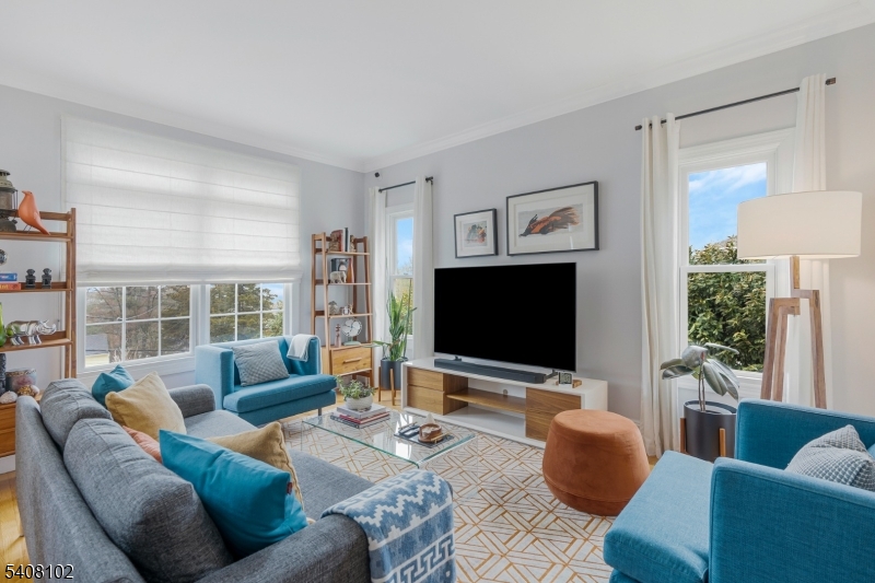 5 Ridge Road Warren, NJ 07059 - Photo 4 of 39 a living room with furniture and a flat screen tv