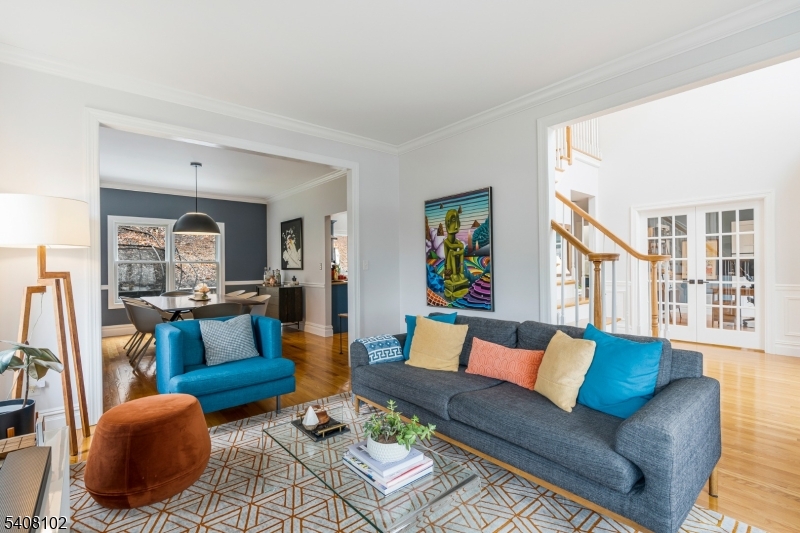 5 Ridge Road Warren, NJ 07059 - Photo 5 of 39 a living room with furniture and a dining table