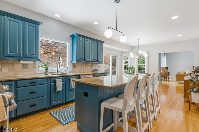 5 Ridge Road Warren, NJ 07059 - Photo 8 of 39 a view of a kitchen area with furniture and windows