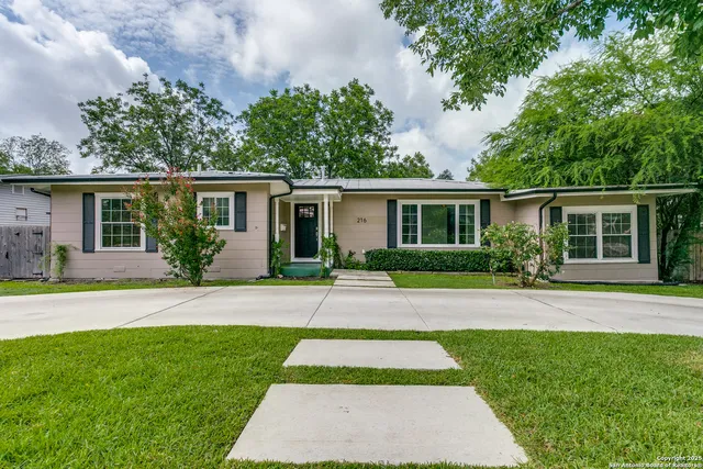front view of house with a yard