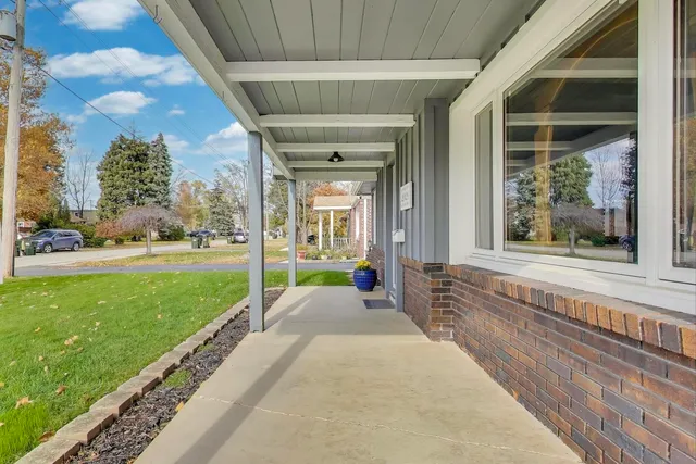 a house with garden in front of it