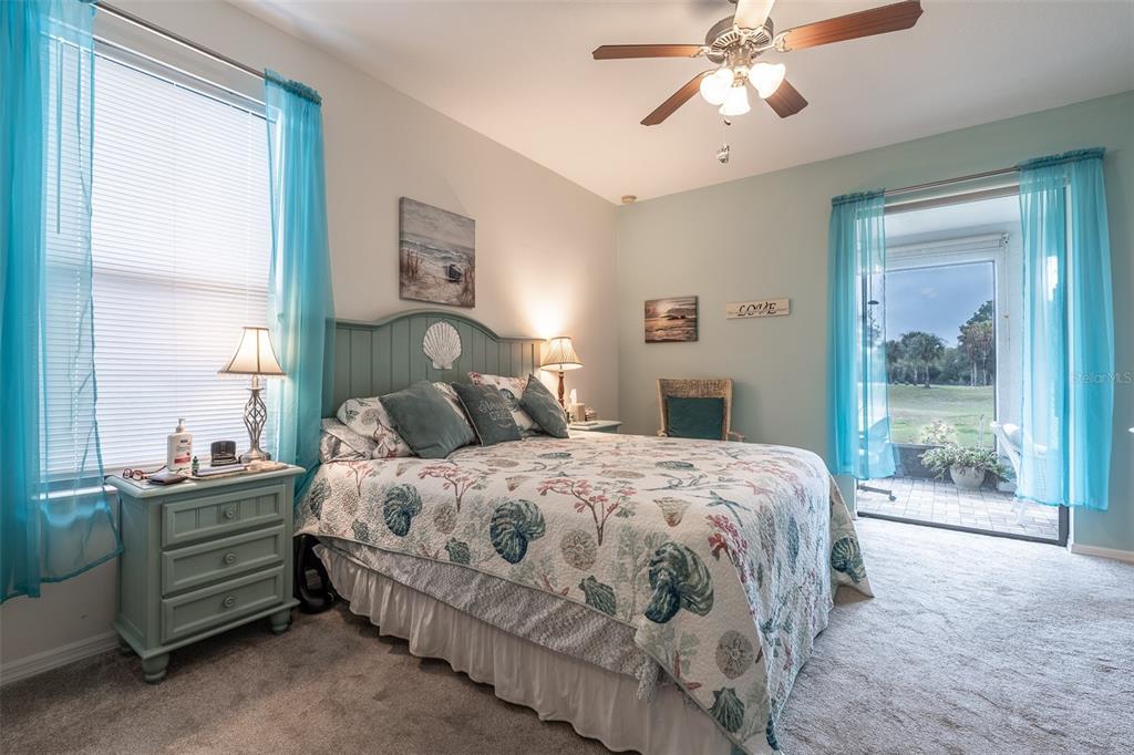 15969 Southwest 14th Avenue Road Ocala, FL 34473 - Photo 19 of 46 a bedroom with a bed and a window
