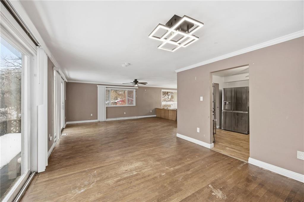 3801 Greenfield Road Allison Park, PA 15101 - Photo 11 of 39 a view of empty room with wooden floor and fan