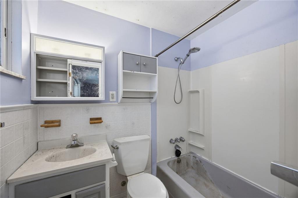 3801 Greenfield Road Allison Park, PA 15101 - Photo 17 of 39 a bathroom with a sink toilet tub and shower