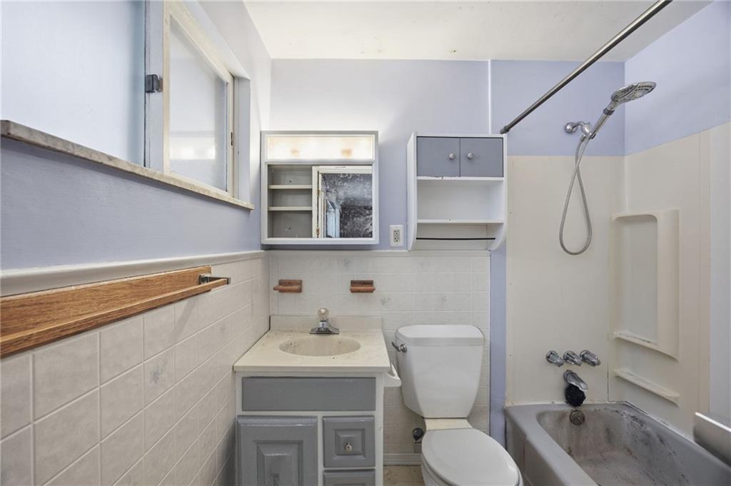 3801 Greenfield Road Allison Park, PA 15101 - Photo 19 of 39 a bathroom with a sink toilet and shower
