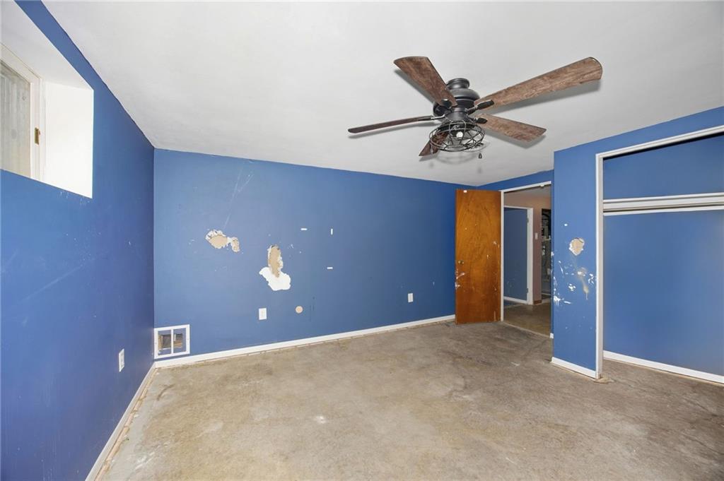 3801 Greenfield Road Allison Park, PA 15101 - Photo 21 of 39 a view of a livingroom with a ceiling fan and window