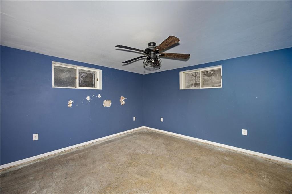 3801 Greenfield Road Allison Park, PA 15101 - Photo 30 of 39 a view of an empty room with a ceiling fan and window