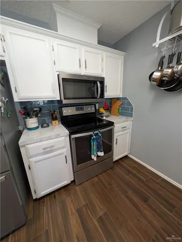 a utility room with washer and dryer