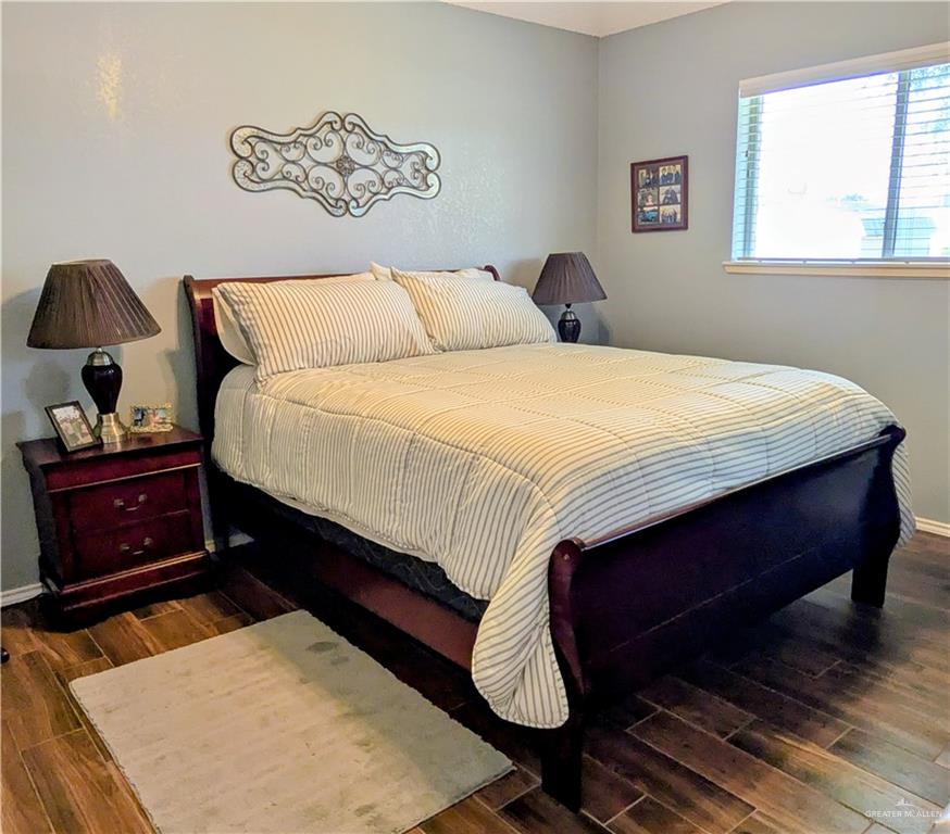 2104 Mockingbird Street Palmview, TX 78572 - Photo 15 of 23 a bedroom with a bed and a window