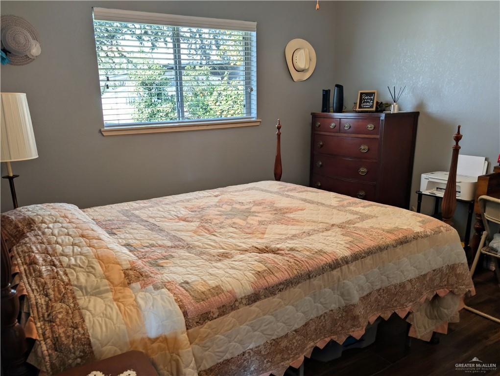 2104 Mockingbird Street Palmview, TX 78572 - Photo 16 of 23 a bedroom with a bed and a window