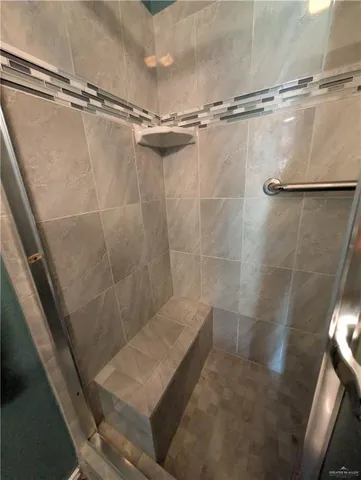 a close view of a shower in bathroom