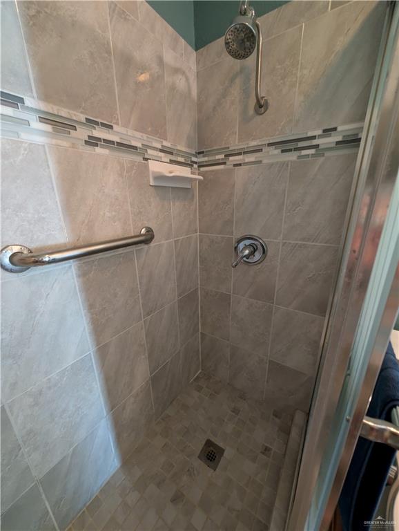 2104 Mockingbird Street Palmview, TX 78572 - Photo 21 of 23 a close view of a shower in bathroom