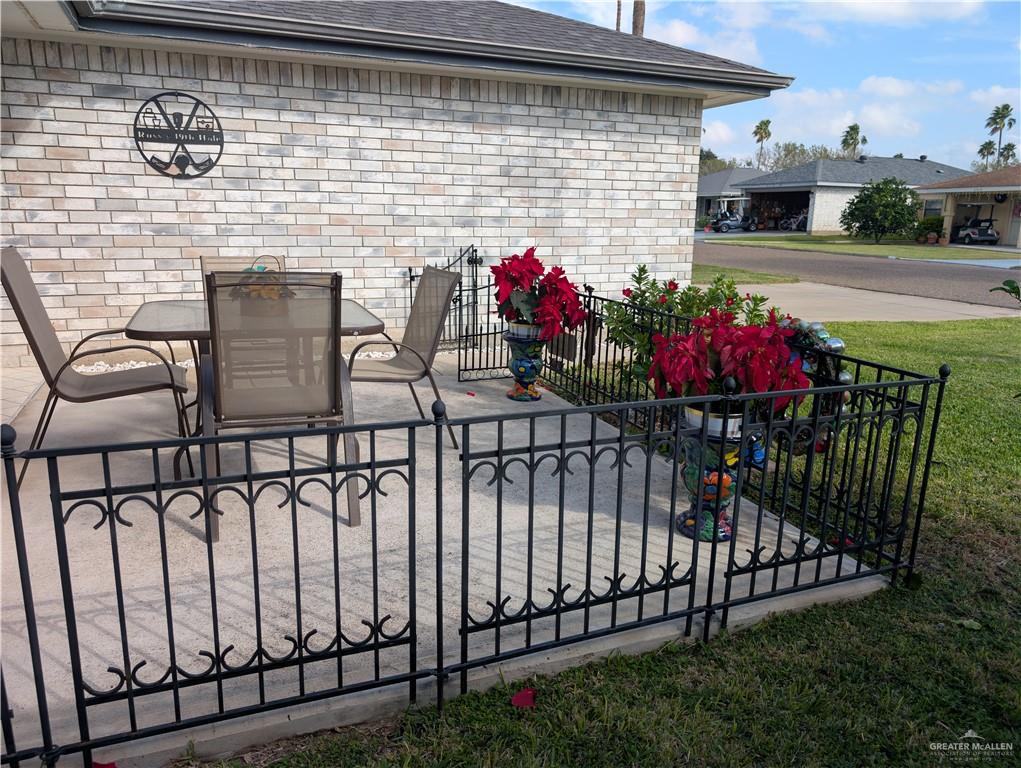 2104 Mockingbird Street Palmview, TX 78572 - Photo 3 of 23 a view of a porch with a table