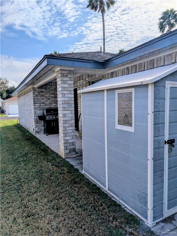 2104 Mockingbird Street Palmview, TX 78572 - Photo 5 of 23 a front view of a house with a yard
