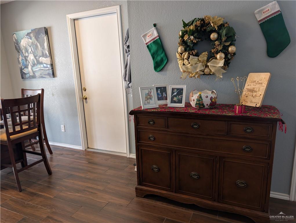 2104 Mockingbird Street Palmview, TX 78572 - Photo 9 of 23 a living room with furniture and a mirror