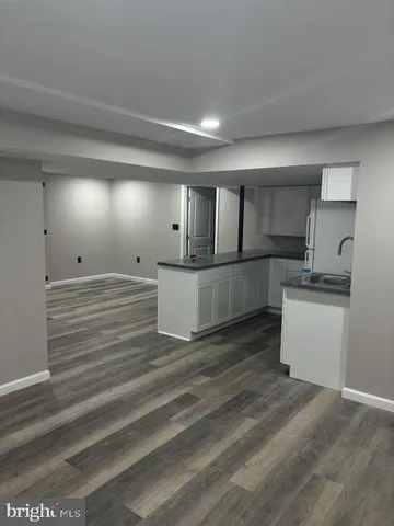 a view of a kitchen with a sink