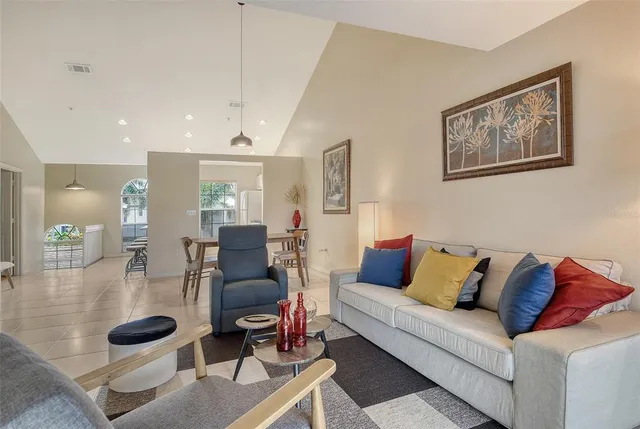 a dining room with furniture and window