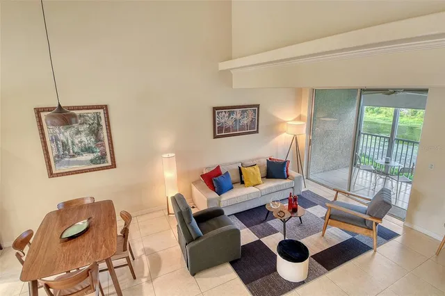 a living room with furniture and a table