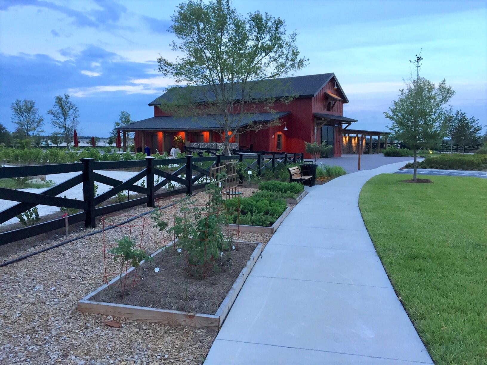 19059 Fly Rod Road Loxahatchee, FL 33470 - Photo 49 of 66 Sidewalk Herb Garden & Barn at Dusk