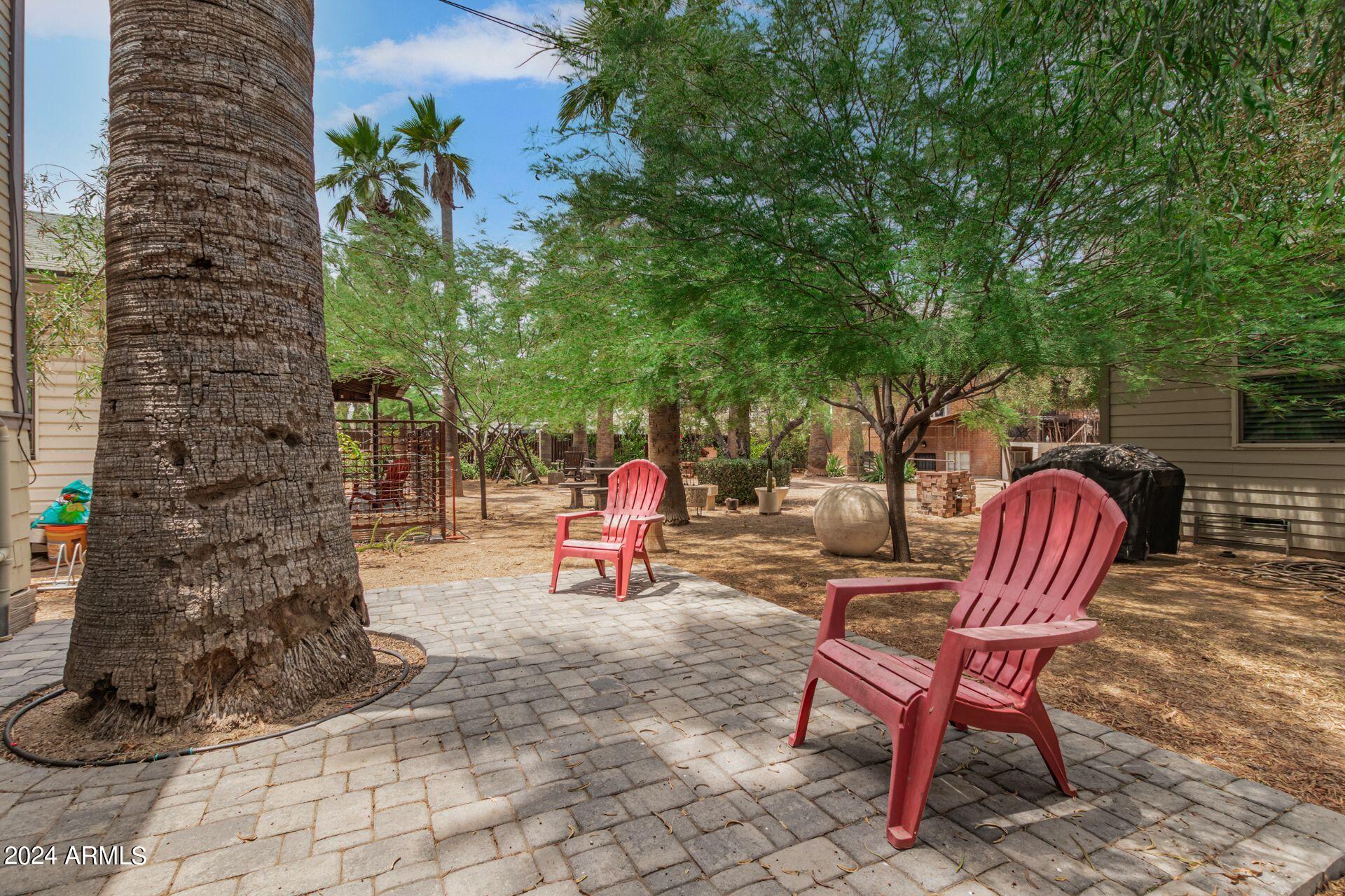 1030 East Polk Street Phoenix, AZ 85006 - Photo 26 of 33 a view of a chairs in a patio