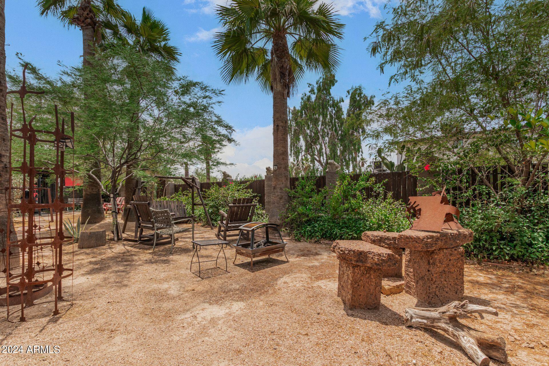 1030 East Polk Street Phoenix, AZ 85006 - Photo 28 of 33 a view of a backyard with sitting area