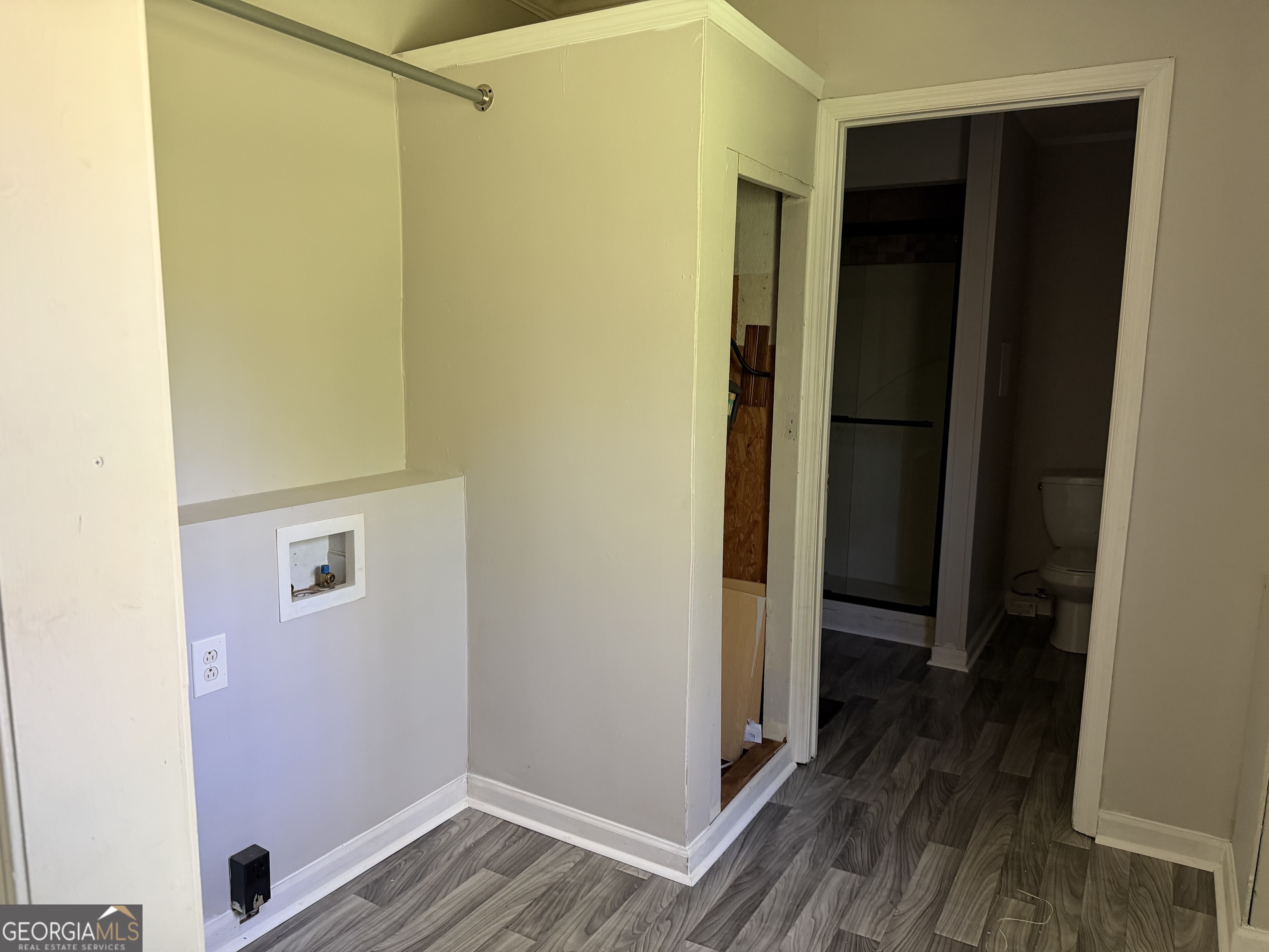 114 A Street Northeast Thomaston, GA 30286 - Photo 5 of 11 a view of a hallway with wooden floor
