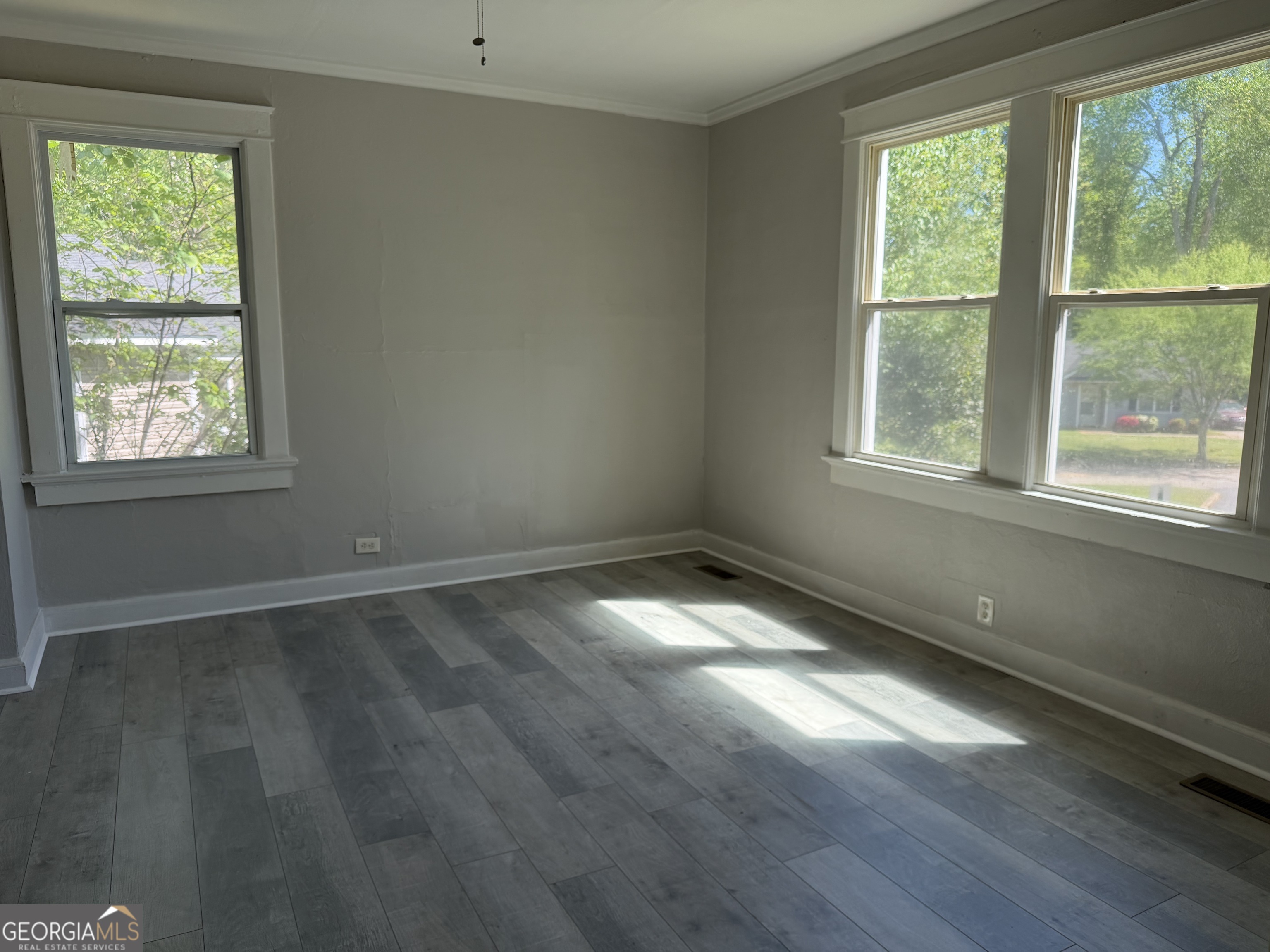 114 A Street Northeast Thomaston, GA 30286 - Photo 6 of 11 a view of empty room with wooden floor and fan