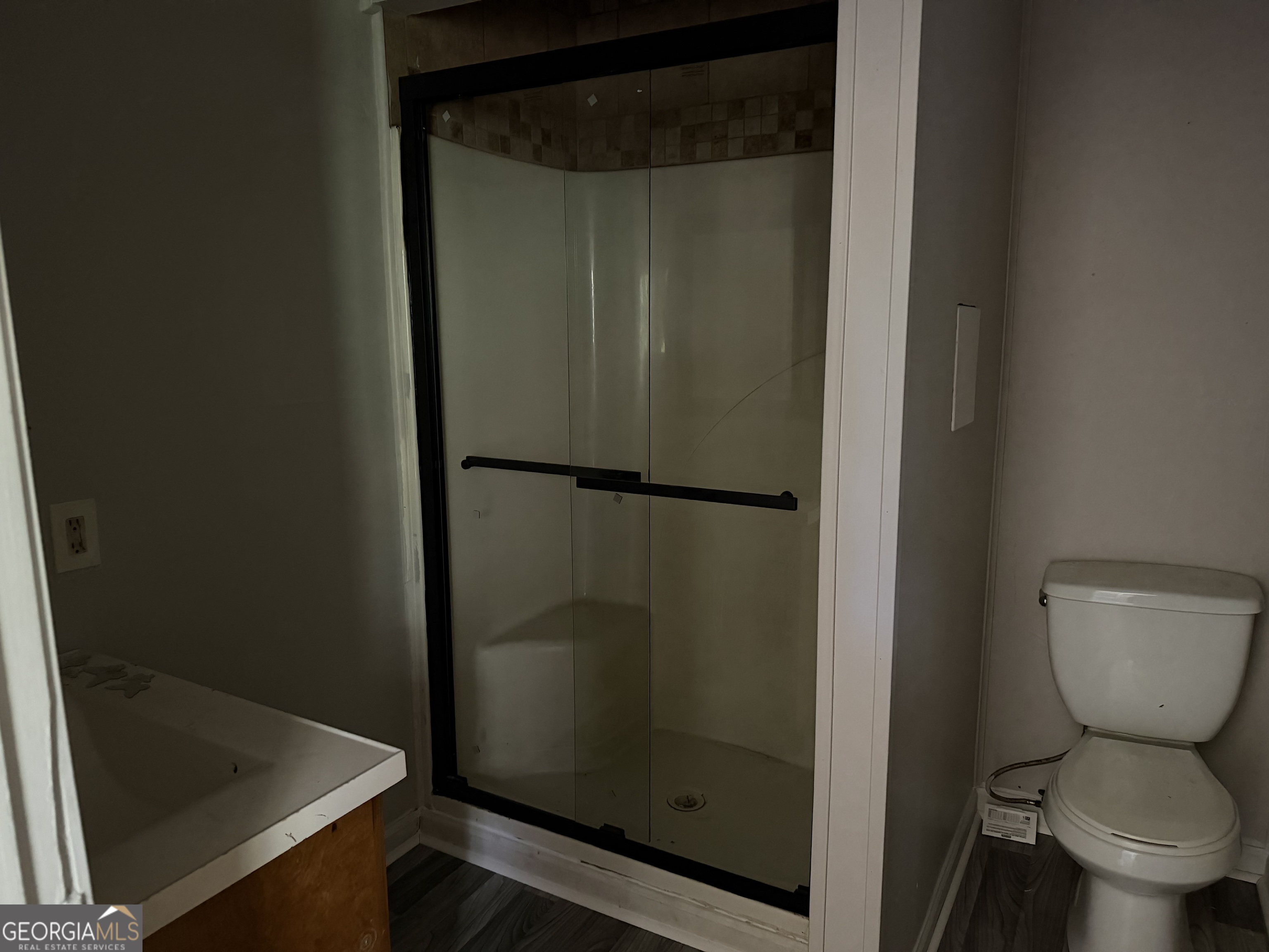 114 A Street Northeast Thomaston, GA 30286 - Photo 9 of 11 a bathroom with a toilet and a shower