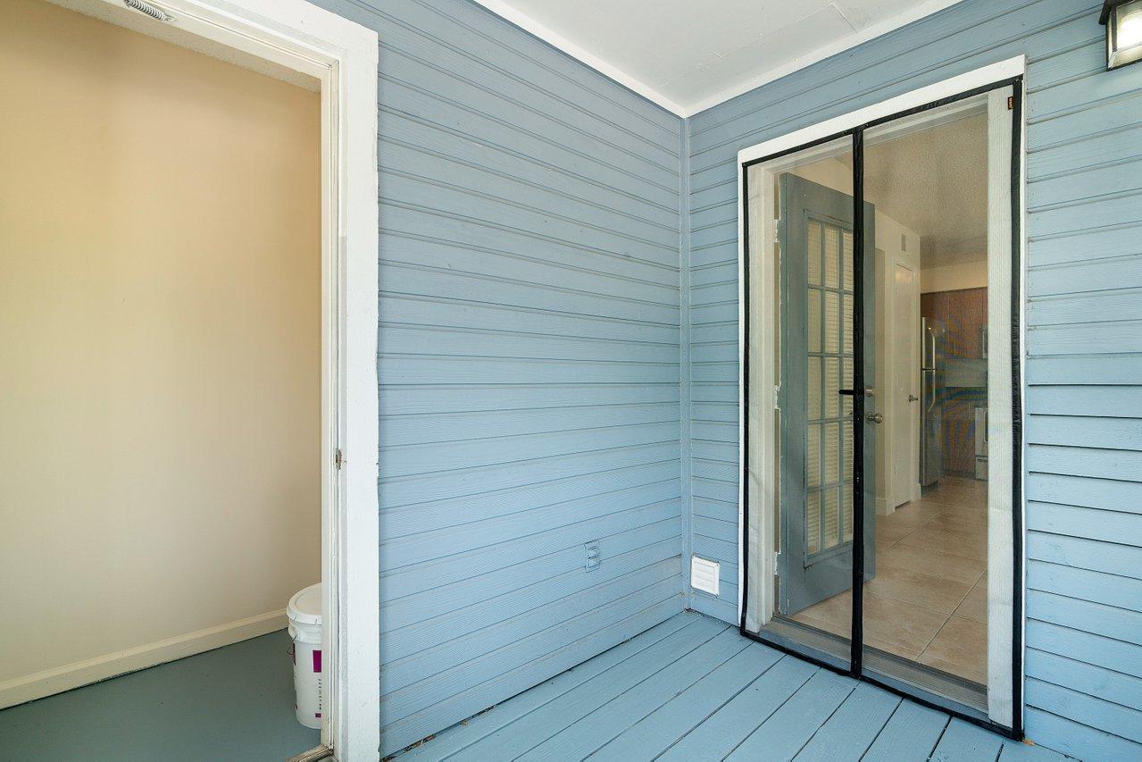 1275 Crystal Way, Unit B Delray Beach, FL 33444 - Photo 16 of 37 a view of wooden door