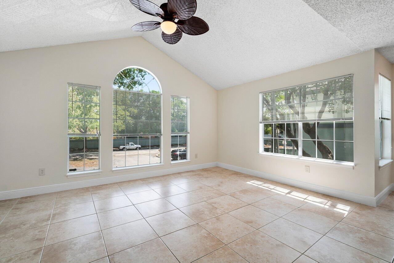 1275 Crystal Way, Unit B Delray Beach, FL 33444 - Photo 5 of 37 a view of an empty room with a window
