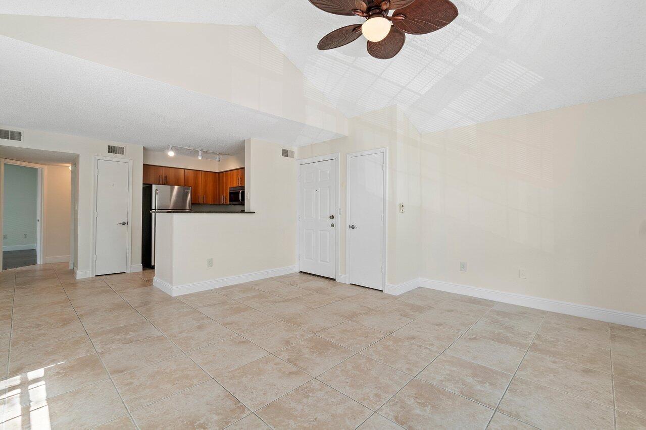 1275 Crystal Way, Unit B Delray Beach, FL 33444 - Photo 6 of 37 a view of empty room with wooden floor