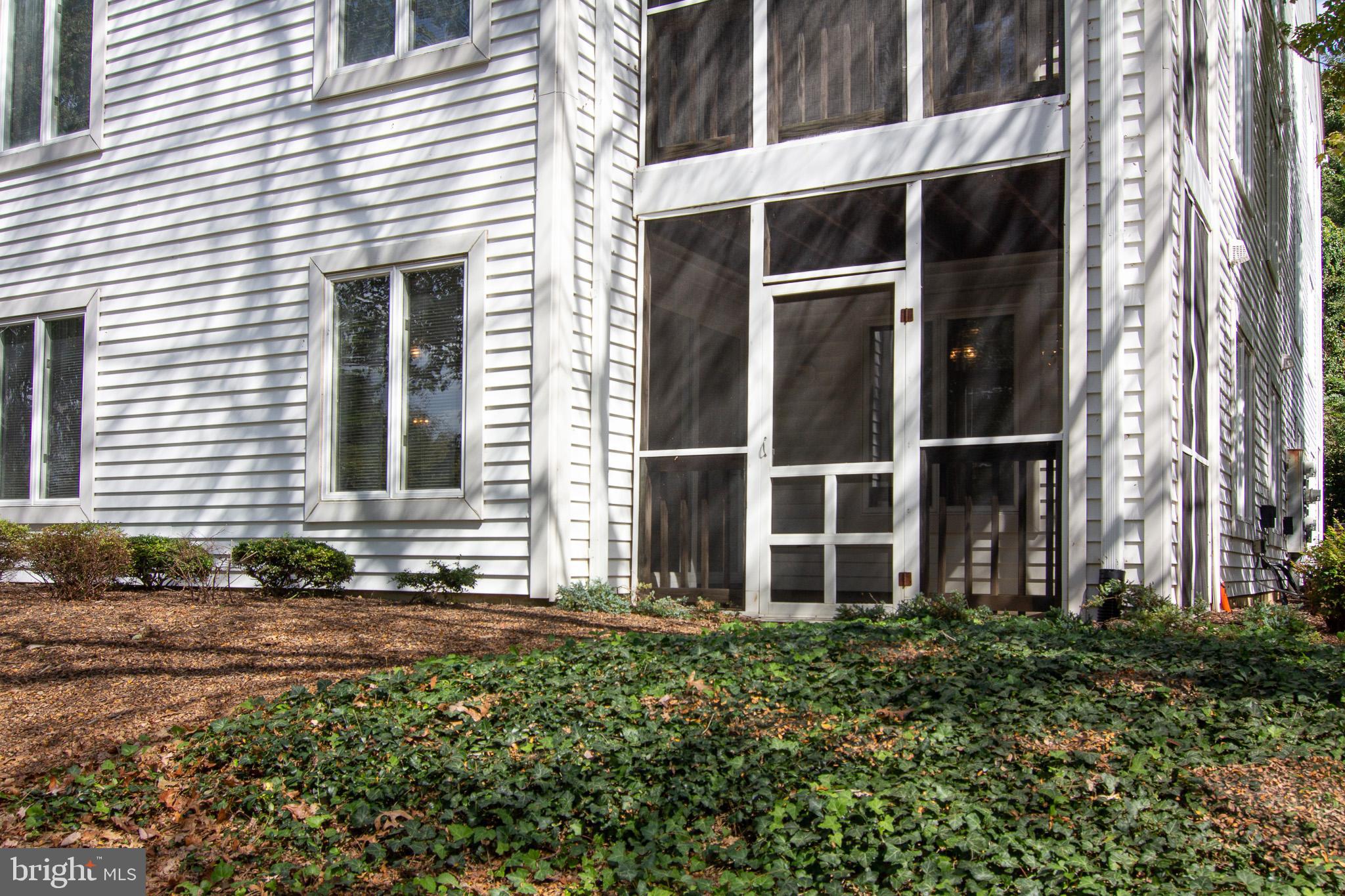 Exterior view of the condo & the screened porch