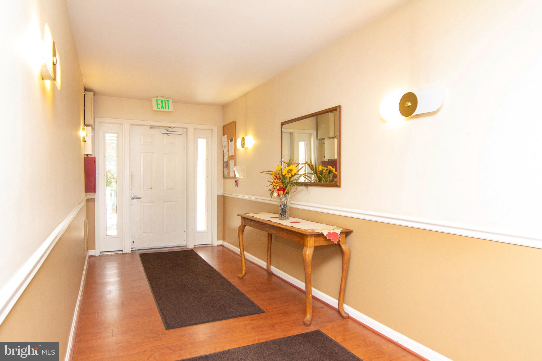 View of the building lobby & main entrance door