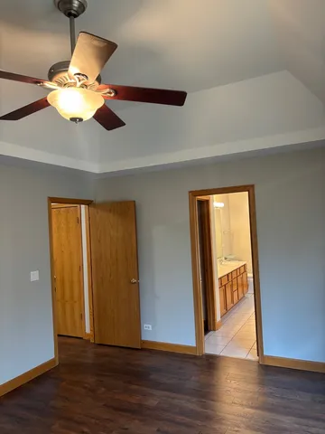 a view of a livingroom with wooden floor