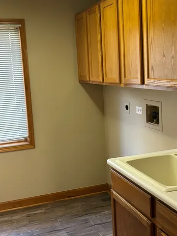 a view of storage and utility room