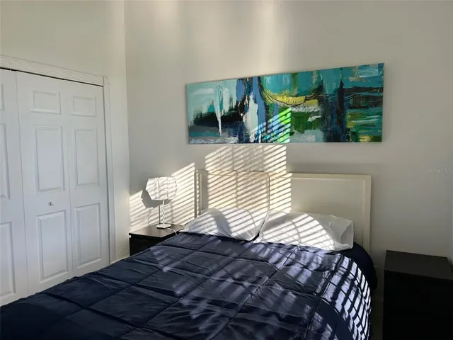 a bathroom with a tub and shower