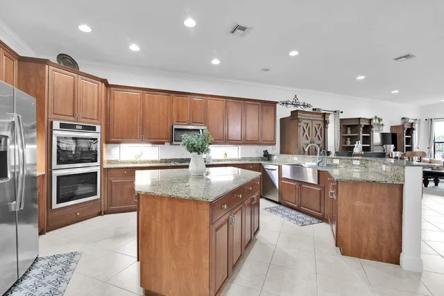 $9,000 | 10703 Versailles Boulevard, Wellington, FL 33449